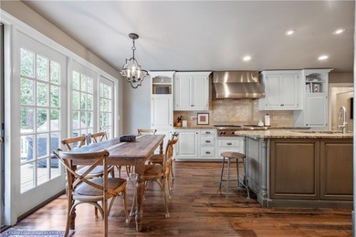 Beautifully situated on a peaceful +/-1.2-acre lot in one of on North Fulton Golf Course in Georgia - for sale on GolfHomes.com, golf home, golf lot