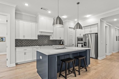 This stunning open ranch plan offers effortless, low-maintenance on Harbor Club Golf and Country Club in Georgia - for sale on GolfHomes.com, golf home, golf lot