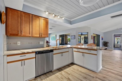 TURNKEY 2 BEDROOM, 2 BATH, 2 CAR GARAGE & POOL HOME IN on Oyster Creek Golf Club in Florida - for sale on GolfHomes.com, golf home, golf lot