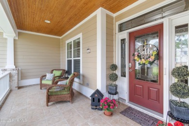 Discover this stunning 4-bedroom, 3-bath custom Craftsman home on Carolina National Golf Club in North Carolina - for sale on GolfHomes.com, golf home, golf lot