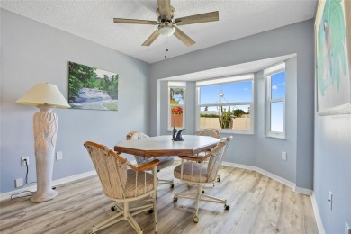 TURNKEY 2 BEDROOM, 2 BATH, 2 CAR GARAGE & POOL HOME IN on Oyster Creek Golf Club in Florida - for sale on GolfHomes.com, golf home, golf lot