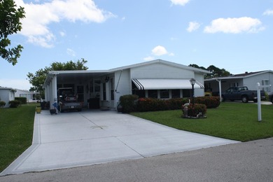 LAND OWNED - Spacious & Open Floor Plan, this 2/2 has large on Savanna Golf Club in Florida - for sale on GolfHomes.com, golf home, golf lot