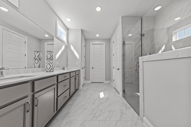 This stunning open ranch plan offers effortless, low-maintenance on Harbor Club Golf and Country Club in Georgia - for sale on GolfHomes.com, golf home, golf lot