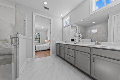 This stunning open ranch plan offers effortless, low-maintenance on Harbor Club Golf and Country Club in Georgia - for sale on GolfHomes.com, golf home, golf lot