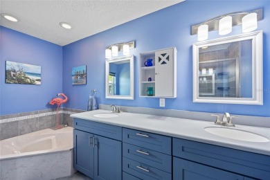TURNKEY 2 BEDROOM, 2 BATH, 2 CAR GARAGE & POOL HOME IN on Oyster Creek Golf Club in Florida - for sale on GolfHomes.com, golf home, golf lot