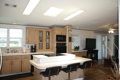 LAND OWNED - Spacious & Open Floor Plan, this 2/2 has large on Savanna Golf Club in Florida - for sale on GolfHomes.com, golf home, golf lot