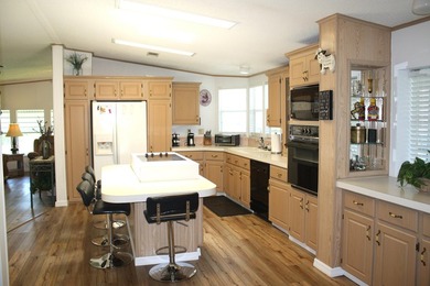 LAND OWNED - Spacious & Open Floor Plan, this 2/2 has large on Savanna Golf Club in Florida - for sale on GolfHomes.com, golf home, golf lot