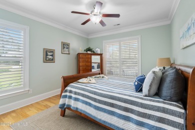 Discover this stunning 4-bedroom, 3-bath custom Craftsman home on Carolina National Golf Club in North Carolina - for sale on GolfHomes.com, golf home, golf lot