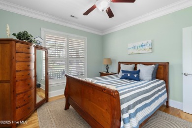 Discover this stunning 4-bedroom, 3-bath custom Craftsman home on Carolina National Golf Club in North Carolina - for sale on GolfHomes.com, golf home, golf lot