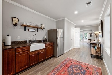 Beautifully situated on a peaceful +/-1.2-acre lot in one of on North Fulton Golf Course in Georgia - for sale on GolfHomes.com, golf home, golf lot