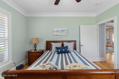 Discover this stunning 4-bedroom, 3-bath custom Craftsman home on Carolina National Golf Club in North Carolina - for sale on GolfHomes.com, golf home, golf lot