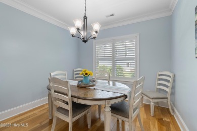 Discover this stunning 4-bedroom, 3-bath custom Craftsman home on Carolina National Golf Club in North Carolina - for sale on GolfHomes.com, golf home, golf lot