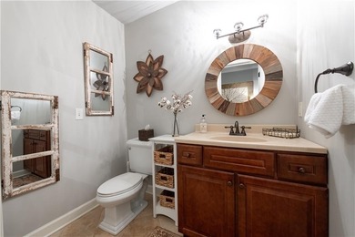 Beautifully situated on a peaceful +/-1.2-acre lot in one of on North Fulton Golf Course in Georgia - for sale on GolfHomes.com, golf home, golf lot