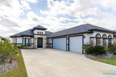 Beautiful lakefront home in the SPI Golf Community! This on South Padre Island Golf Club in Texas - for sale on GolfHomes.com, golf home, golf lot