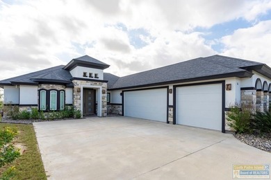 Beautiful lakefront home in the SPI Golf Community! This on South Padre Island Golf Club in Texas - for sale on GolfHomes.com, golf home, golf lot