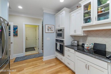 Discover this stunning 4-bedroom, 3-bath custom Craftsman home on Carolina National Golf Club in North Carolina - for sale on GolfHomes.com, golf home, golf lot