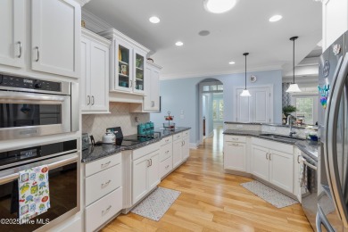 Discover this stunning 4-bedroom, 3-bath custom Craftsman home on Carolina National Golf Club in North Carolina - for sale on GolfHomes.com, golf home, golf lot