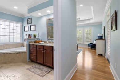 Discover this stunning 4-bedroom, 3-bath custom Craftsman home on Carolina National Golf Club in North Carolina - for sale on GolfHomes.com, golf home, golf lot