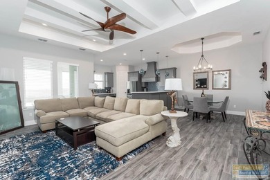 Beautiful lakefront home in the SPI Golf Community! This on South Padre Island Golf Club in Texas - for sale on GolfHomes.com, golf home, golf lot