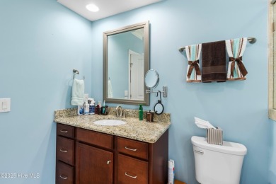 Discover this stunning 4-bedroom, 3-bath custom Craftsman home on Carolina National Golf Club in North Carolina - for sale on GolfHomes.com, golf home, golf lot