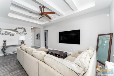 Beautiful lakefront home in the SPI Golf Community! This on South Padre Island Golf Club in Texas - for sale on GolfHomes.com, golf home, golf lot