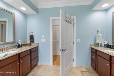 Discover this stunning 4-bedroom, 3-bath custom Craftsman home on Carolina National Golf Club in North Carolina - for sale on GolfHomes.com, golf home, golf lot