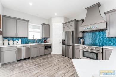 Beautiful lakefront home in the SPI Golf Community! This on South Padre Island Golf Club in Texas - for sale on GolfHomes.com, golf home, golf lot