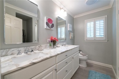 Beautifully situated on a peaceful +/-1.2-acre lot in one of on North Fulton Golf Course in Georgia - for sale on GolfHomes.com, golf home, golf lot