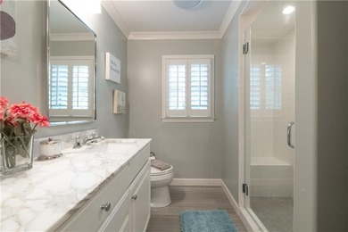 Beautifully situated on a peaceful +/-1.2-acre lot in one of on North Fulton Golf Course in Georgia - for sale on GolfHomes.com, golf home, golf lot