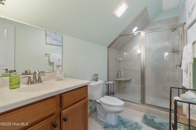 Discover this stunning 4-bedroom, 3-bath custom Craftsman home on Carolina National Golf Club in North Carolina - for sale on GolfHomes.com, golf home, golf lot