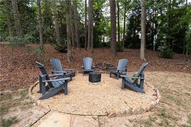 Beautifully situated on a peaceful +/-1.2-acre lot in one of on North Fulton Golf Course in Georgia - for sale on GolfHomes.com, golf home, golf lot