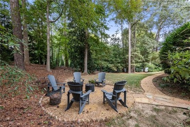 Beautifully situated on a peaceful +/-1.2-acre lot in one of on North Fulton Golf Course in Georgia - for sale on GolfHomes.com, golf home, golf lot