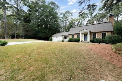 Beautifully situated on a peaceful +/-1.2-acre lot in one of on North Fulton Golf Course in Georgia - for sale on GolfHomes.com, golf home, golf lot