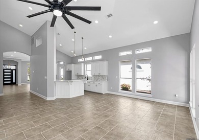 Discover 6210 Royal Palm Ct -- a fully remodeled 5-bedroom on Pelican Point Golf Club in Louisiana - for sale on GolfHomes.com, golf home, golf lot