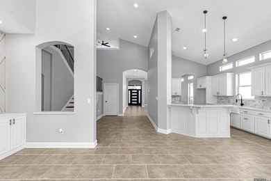 Discover 6210 Royal Palm Ct -- a fully remodeled 5-bedroom on Pelican Point Golf Club in Louisiana - for sale on GolfHomes.com, golf home, golf lot