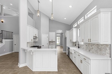 Discover 6210 Royal Palm Ct -- a fully remodeled 5-bedroom on Pelican Point Golf Club in Louisiana - for sale on GolfHomes.com, golf home, golf lot