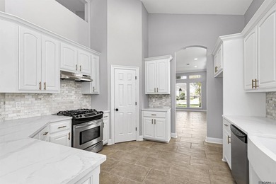 Discover 6210 Royal Palm Ct -- a fully remodeled 5-bedroom on Pelican Point Golf Club in Louisiana - for sale on GolfHomes.com, golf home, golf lot