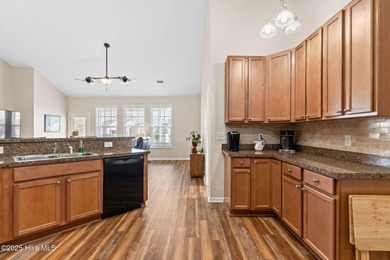 Beautiful 4 bedroom, 3 bath home with a courtyard garage entry on Crow Creek Golf Club in North Carolina - for sale on GolfHomes.com, golf home, golf lot