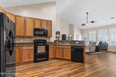 Beautiful 4 bedroom, 3 bath home with a courtyard garage entry on Crow Creek Golf Club in North Carolina - for sale on GolfHomes.com, golf home, golf lot