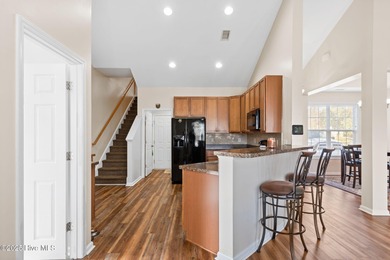 Beautiful 4 bedroom, 3 bath home with a courtyard garage entry on Crow Creek Golf Club in North Carolina - for sale on GolfHomes.com, golf home, golf lot