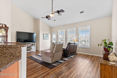 Beautiful 4 bedroom, 3 bath home with a courtyard garage entry on Crow Creek Golf Club in North Carolina - for sale on GolfHomes.com, golf home, golf lot