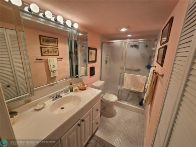 Enjoy golf course views from this beautifully maintained on Wynmoor Golf Course in Florida - for sale on GolfHomes.com, golf home, golf lot