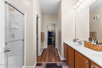 Beautiful 4 bedroom, 3 bath home with a courtyard garage entry on Crow Creek Golf Club in North Carolina - for sale on GolfHomes.com, golf home, golf lot