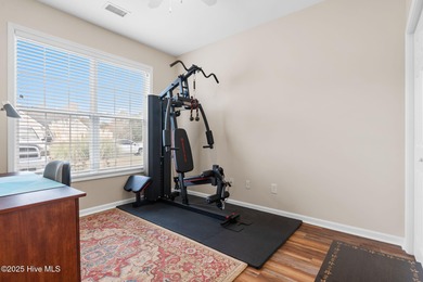 Beautiful 4 bedroom, 3 bath home with a courtyard garage entry on Crow Creek Golf Club in North Carolina - for sale on GolfHomes.com, golf home, golf lot