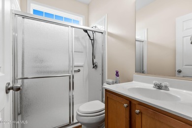 Beautiful 4 bedroom, 3 bath home with a courtyard garage entry on Crow Creek Golf Club in North Carolina - for sale on GolfHomes.com, golf home, golf lot