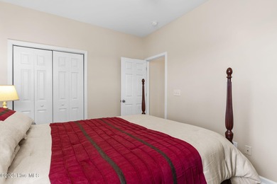 Beautiful 4 bedroom, 3 bath home with a courtyard garage entry on Crow Creek Golf Club in North Carolina - for sale on GolfHomes.com, golf home, golf lot