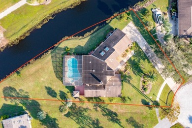 Welcome to this stunning, high-and-dry, custom-built brick home on The Club At Pelican Bay - North Course in Florida - for sale on GolfHomes.com, golf home, golf lot