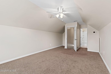 Beautiful 4 bedroom, 3 bath home with a courtyard garage entry on Crow Creek Golf Club in North Carolina - for sale on GolfHomes.com, golf home, golf lot