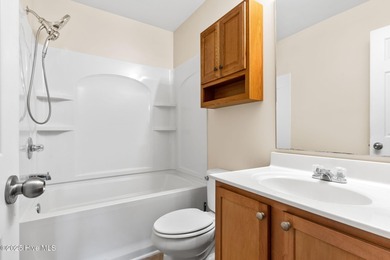 Beautiful 4 bedroom, 3 bath home with a courtyard garage entry on Crow Creek Golf Club in North Carolina - for sale on GolfHomes.com, golf home, golf lot