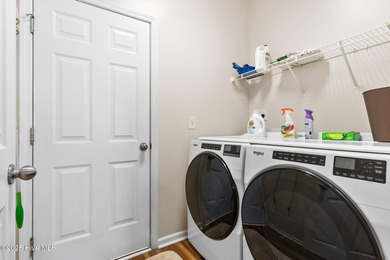 Beautiful 4 bedroom, 3 bath home with a courtyard garage entry on Crow Creek Golf Club in North Carolina - for sale on GolfHomes.com, golf home, golf lot